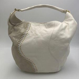 Like New Carlos Falchi hobo bag. White leather and faux snake skin/gold accents